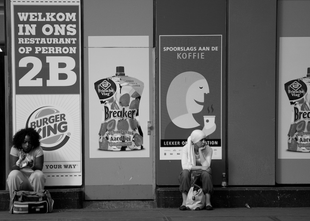 The Netherlands, Amsterdam,
May 2006. 
Waiting 9.
People waiting on the “De Ruyterkade” in Amsterdam.
